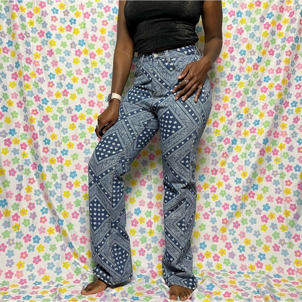 Love these high waist flared jeans.  Bandana heart design. Size XS. No flaws.